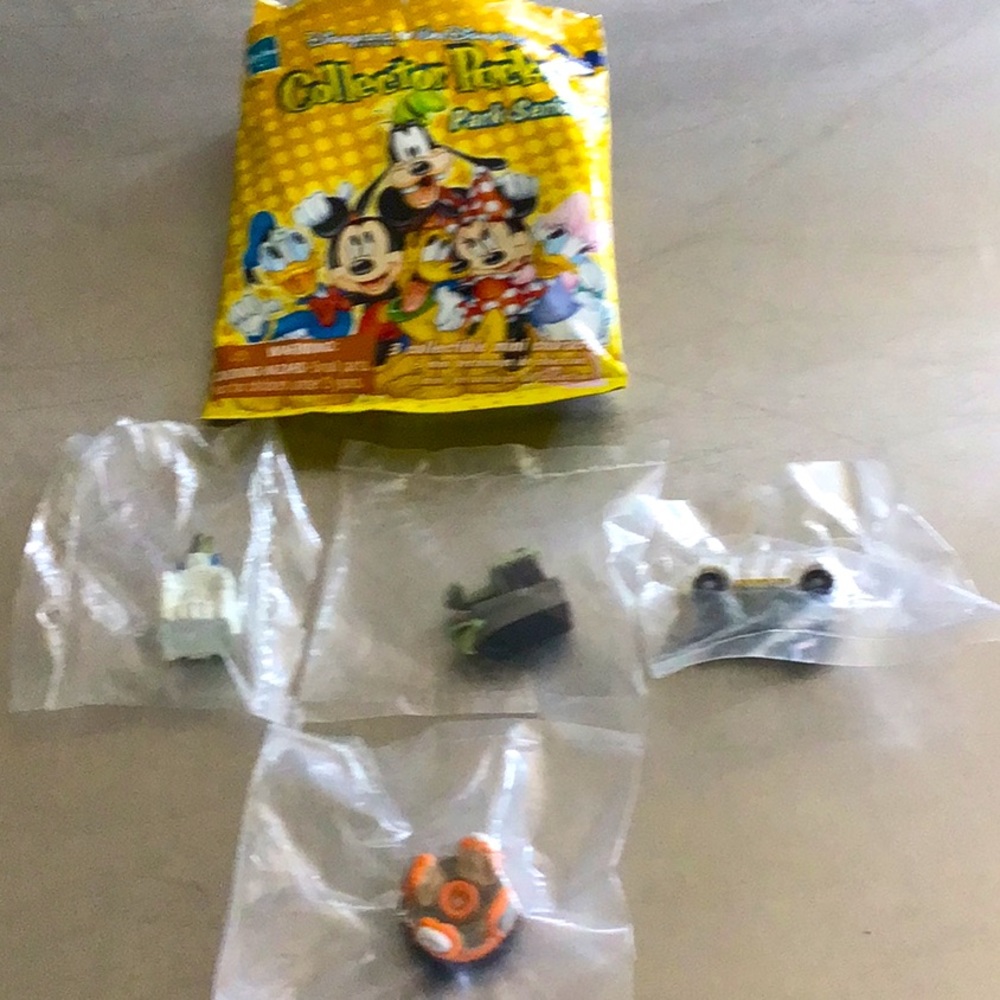 Disney Collector Pack, 4 mini characters each sealed in original bag.